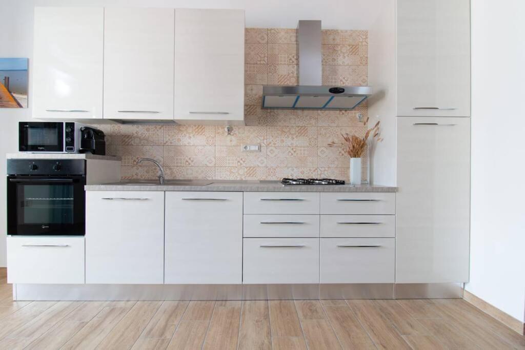 Il Guardiano Del Faro Appartement Càbras Buitenkant foto